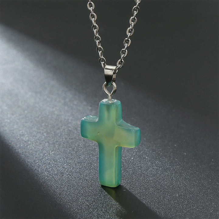 Dainty natural stone cross pendant, women's spiritual necklace with subtle charm.
