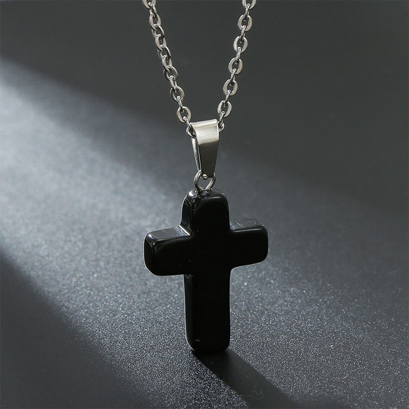 Lustrous natural gemstone cross pendant necklace, women's radiant spiritual jewelry.