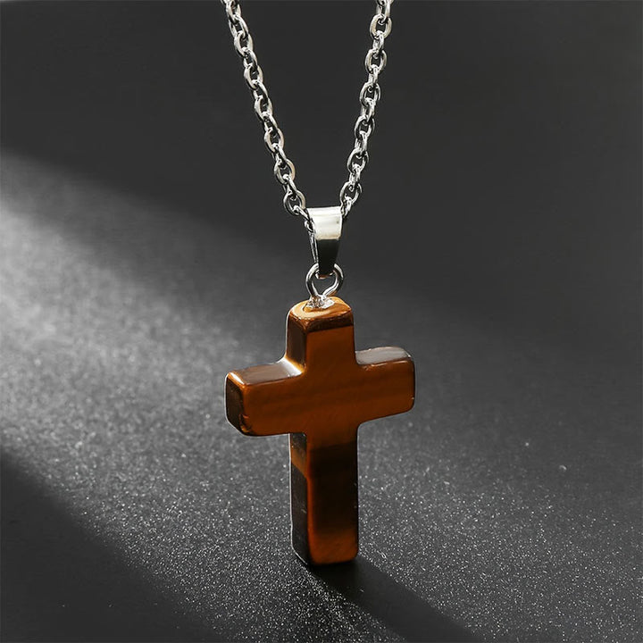 Elegant women's spiritual cross necklace with natural healing crystal. Adjustable & stylish.