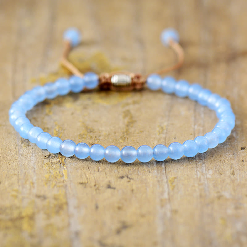 Unique handmade women's adjustable braided bracelet with natural stone chips & freshwater pearls.