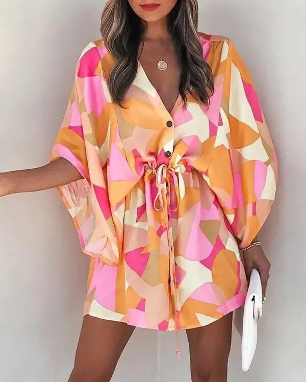 Detail of soft fabric and ruffle sleeve on a stylish women's summer V-neck dress