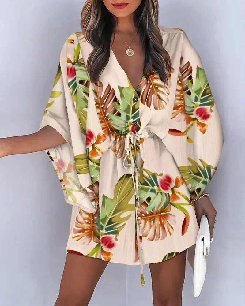 Side profile of a woman in a comfortable V-neck ruffle sleeve summer maxi dress