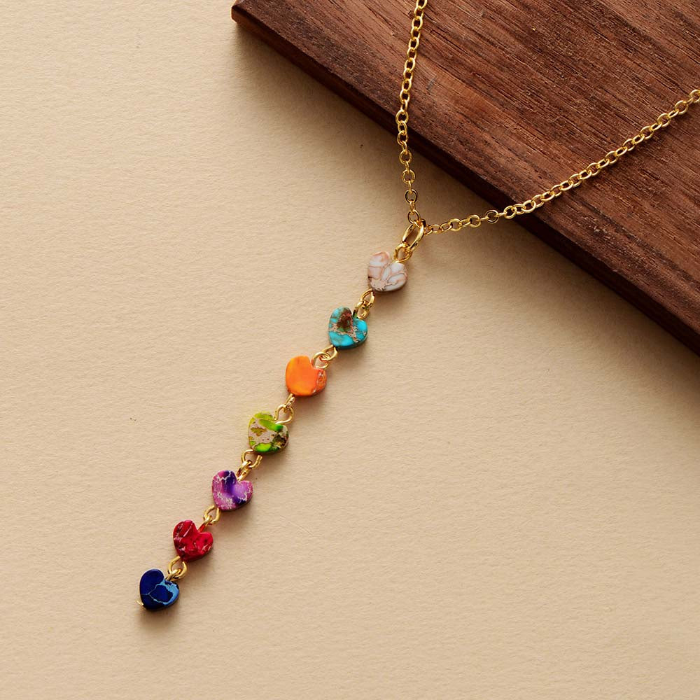 Women's Night Sky 7 Chakra healing pendant, spiritual natural stone necklace for energy balance.