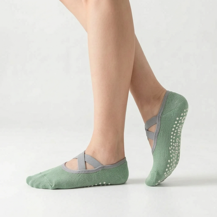 Comfortable green non-slip studio socks for women, perfect for yoga, ballet & fitness classes.