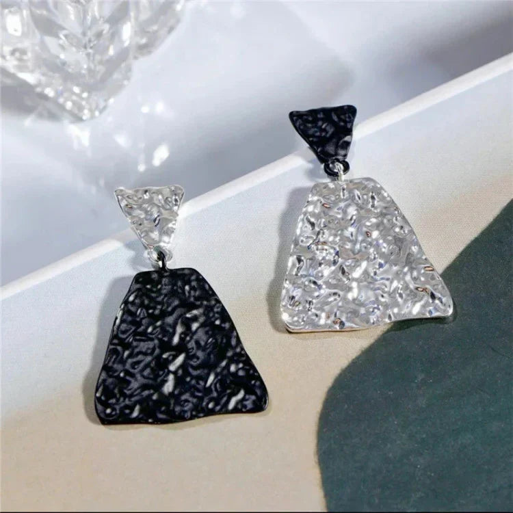 Stylish Women's Nora Magma Texture Statement Earrings for a modern look. Unique stud jewelry, black & white.
