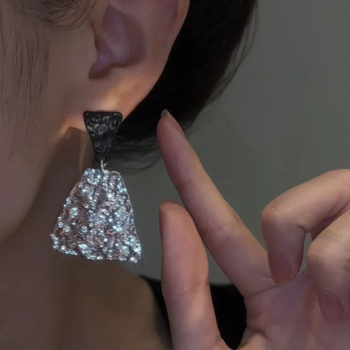 Geometric black and white Nora Magma Texture Statement Earrings. Modern women's stud jewelry with a unique design.