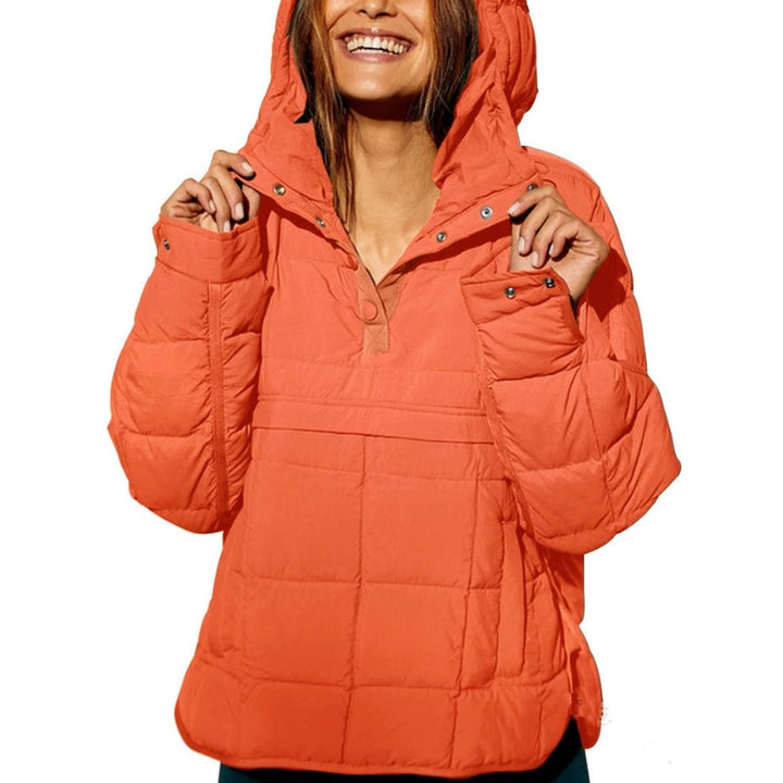 Noria women's packable puffer jacket folded, highlighting its lightweight design for travel.