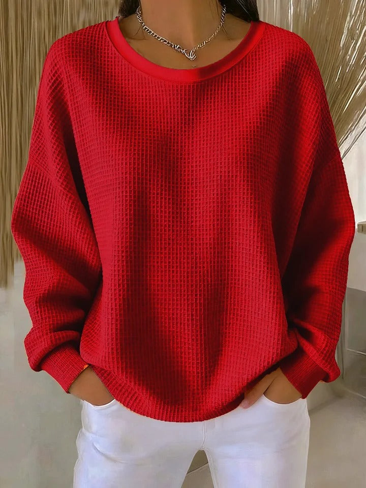 Classic women's long sleeve pullover, a comfortable knit sweater for versatile styling.