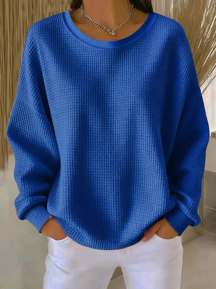 Women's classic knit pullover sweater, providing comfortable, relaxed fit for everyday fashion.