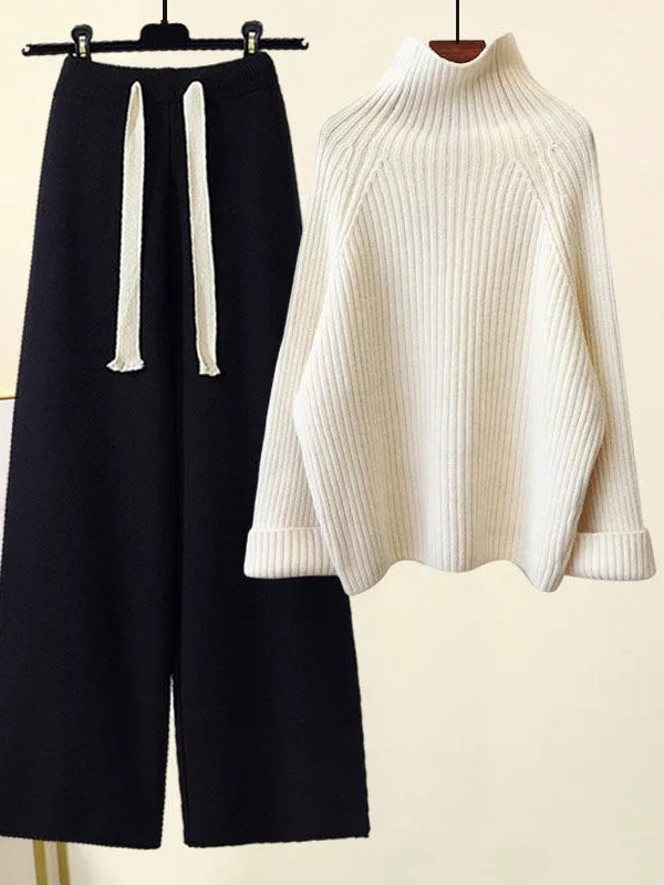 Women's Oasis knit lounge set, two-piece outfit with oversized sweater & wide-leg pants for ultimate comfort & style.