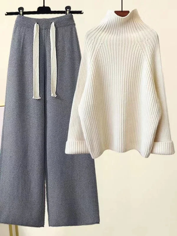 Comfortable women's ribbed knit lounge set featuring a relaxed fit oversized sweater and stylish wide leg pants.