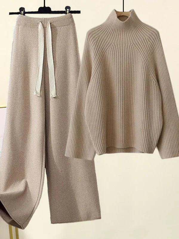 Stylish women's ribbed knit lounge set, a modern two-piece outfit with an oversized sweater and wide leg pants.
