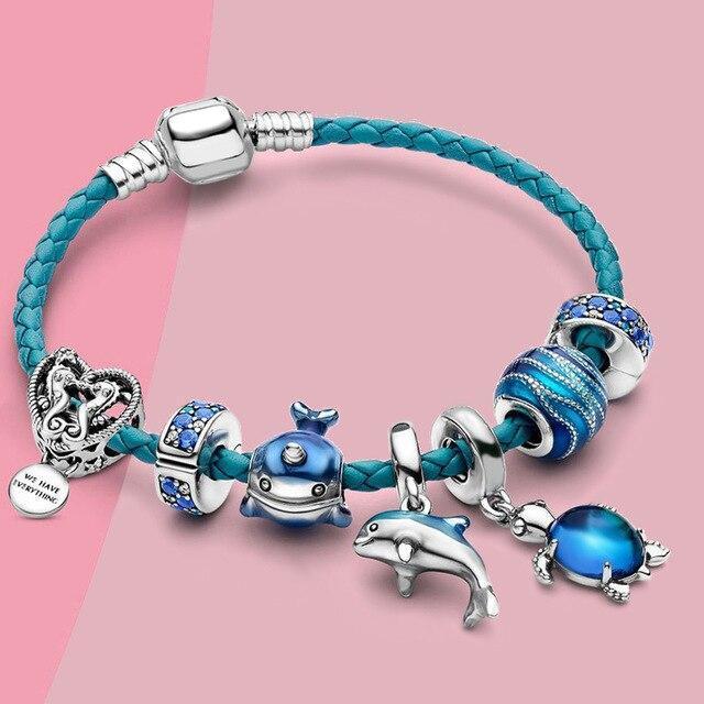 Women's Ocean Breeze leather & silver charm bracelet with sea-themed charms, perfect for everyday wear & gifts.