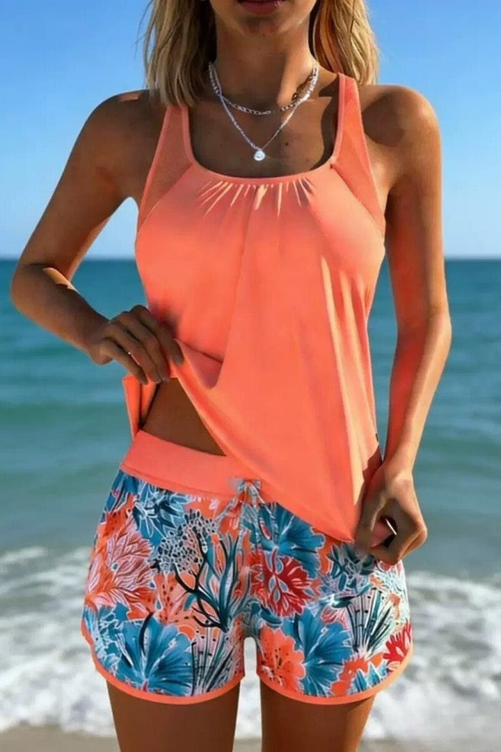 Elegant marine print women's tankini swimwear set. Comfortable and stylish for summer beach or vacation outfits.