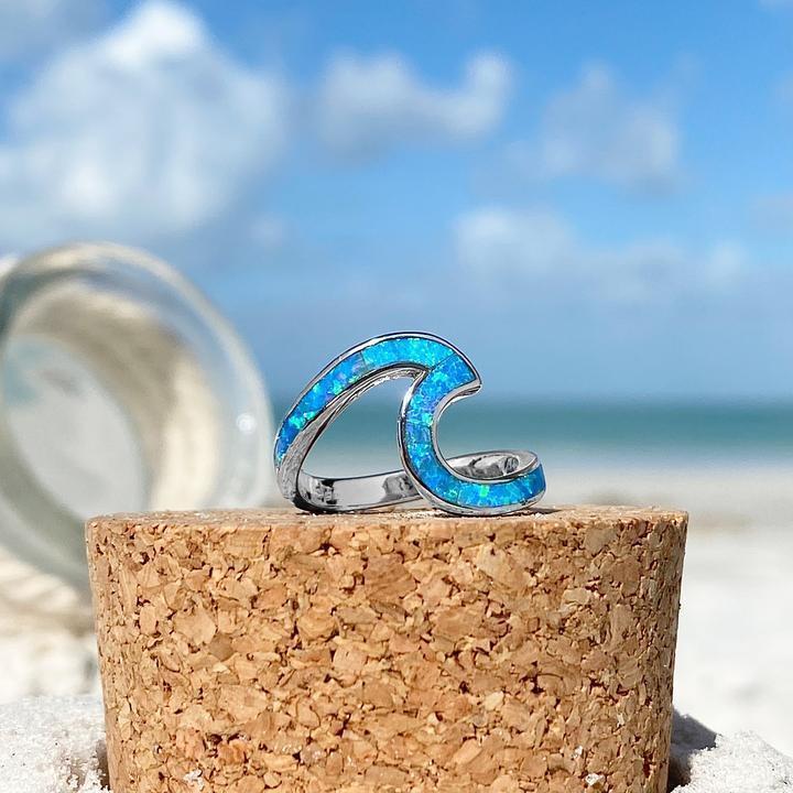 Handmade Women's Opal & Silver Ocean Wave ring, an elegant and unique accessory for women.