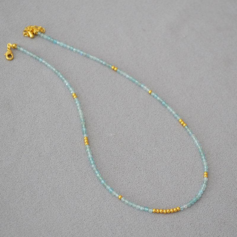 Elegant ocean-themed women's necklace featuring delicate blue beads, perfect for gifts.