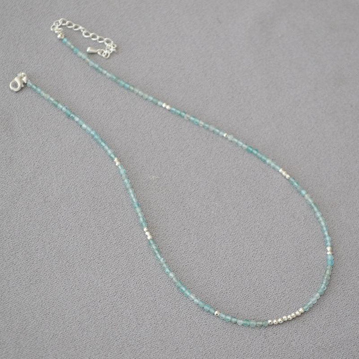 Women's elegant blue bead clavicle necklace, an adjustable Ocean Whisper accessory.