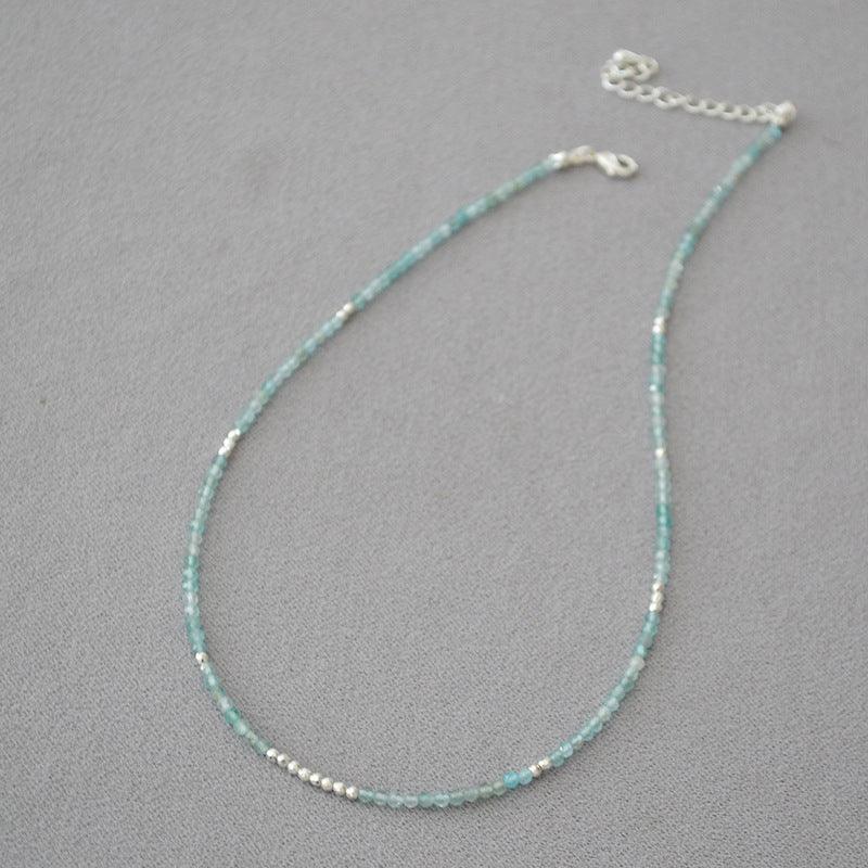 Ocean Whisper women's necklace, a delicate blue bead design, ideal as a gift for her.