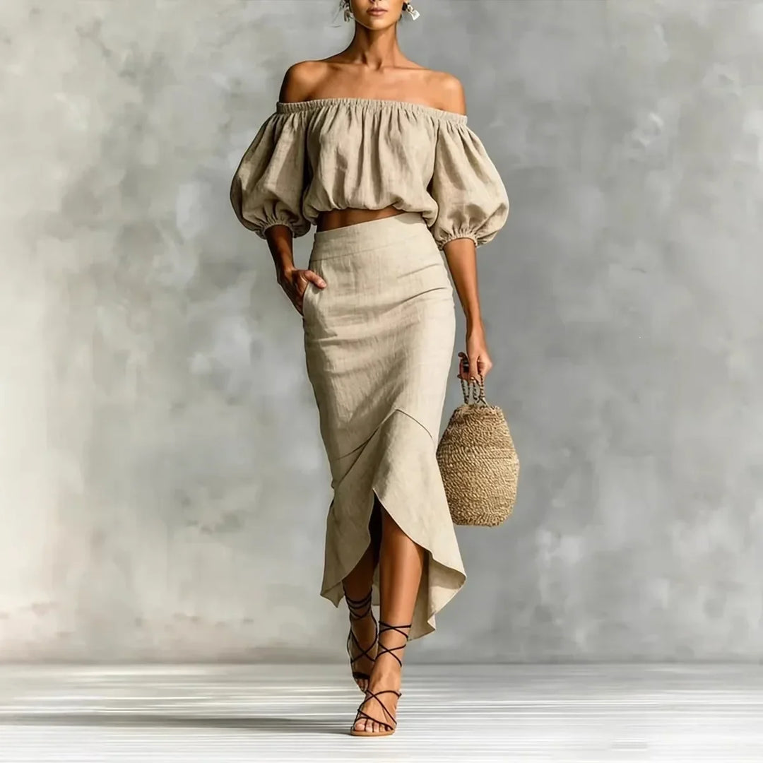 Women's off-shoulder puff sleeve top & midi skirt set. Elegant two-piece summer outfit for stylish women.