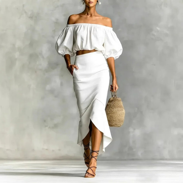 Stylish women's off-shoulder puff sleeve midi skirt set. Perfect two-piece for summer, vacation, or brunch.