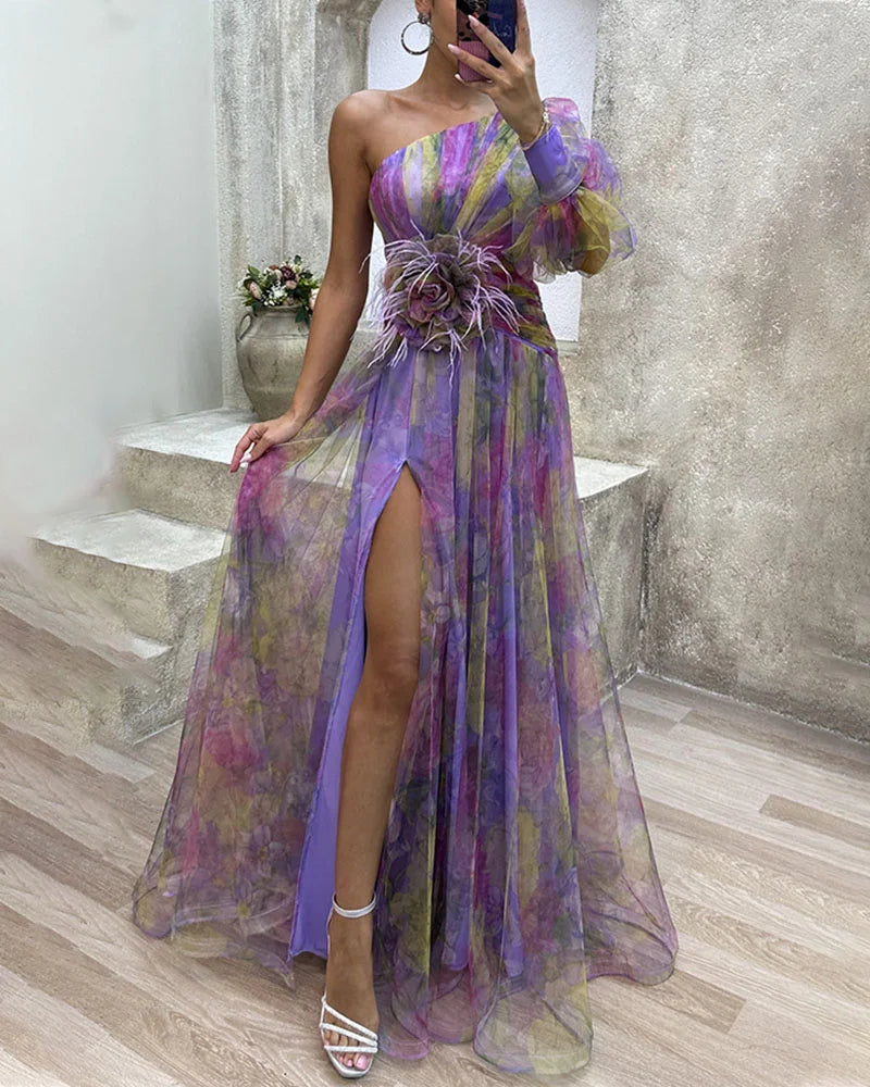 Elegant women's one-shoulder maxi dress featuring a vibrant floral print & stylish high slit.