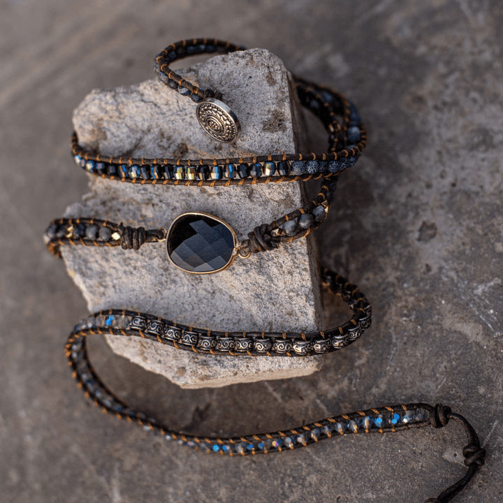 Stack of Onyx Moonlight Protective Wrap Bracelets, demonstrating versatile womens' spiritual accessories