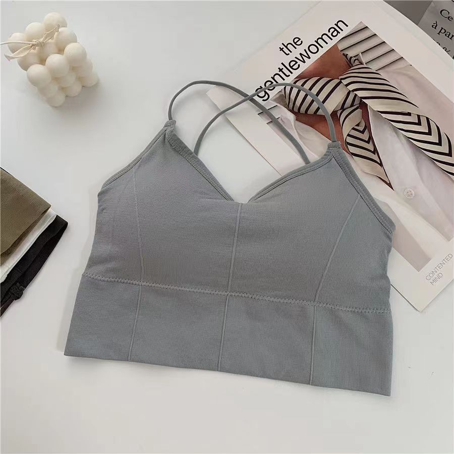 Green open back athletic top, women's activewear, designed for comfort and style