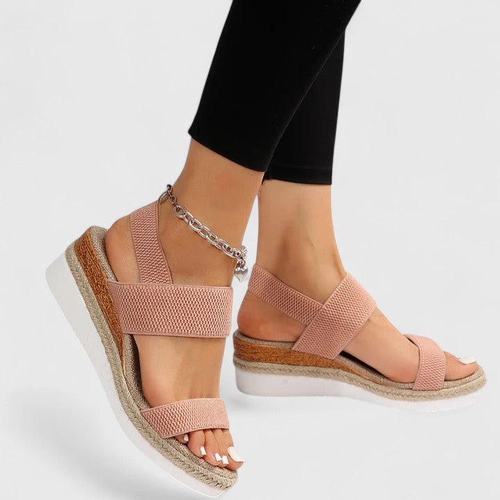 Women's open-toe orthopedic wedge sandals. Comfortable, casual footwear with arch support for summer.