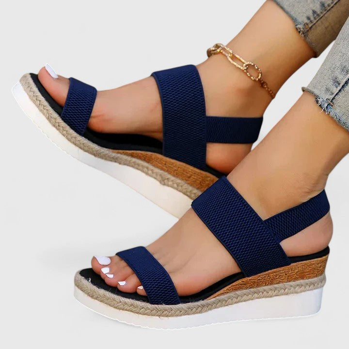 Women's casual open-toe wedge sandals, orthopedic designed with arch support & comfort for summer outings.