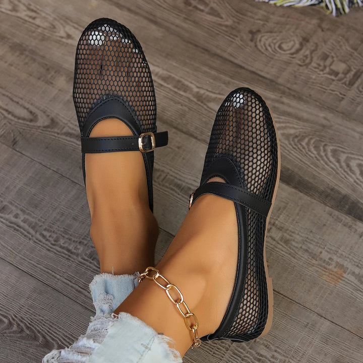Women's open-weave Mary Jane flats, breathable & comfortable. Perfect for casual or office wear.