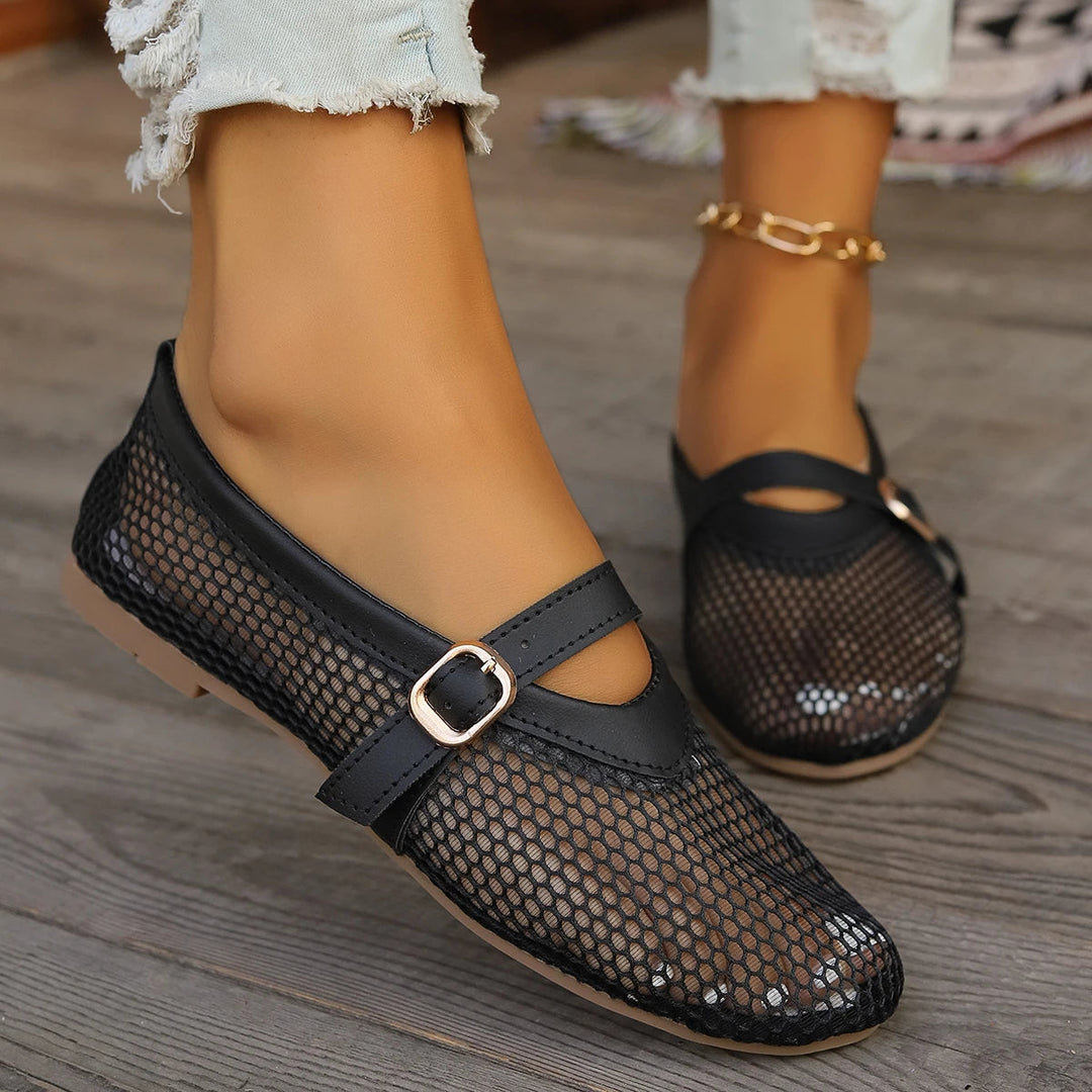Stylish women's open-weave Mary Jane flats, ideal for summer. Lightweight & breathable for all-day comfort.