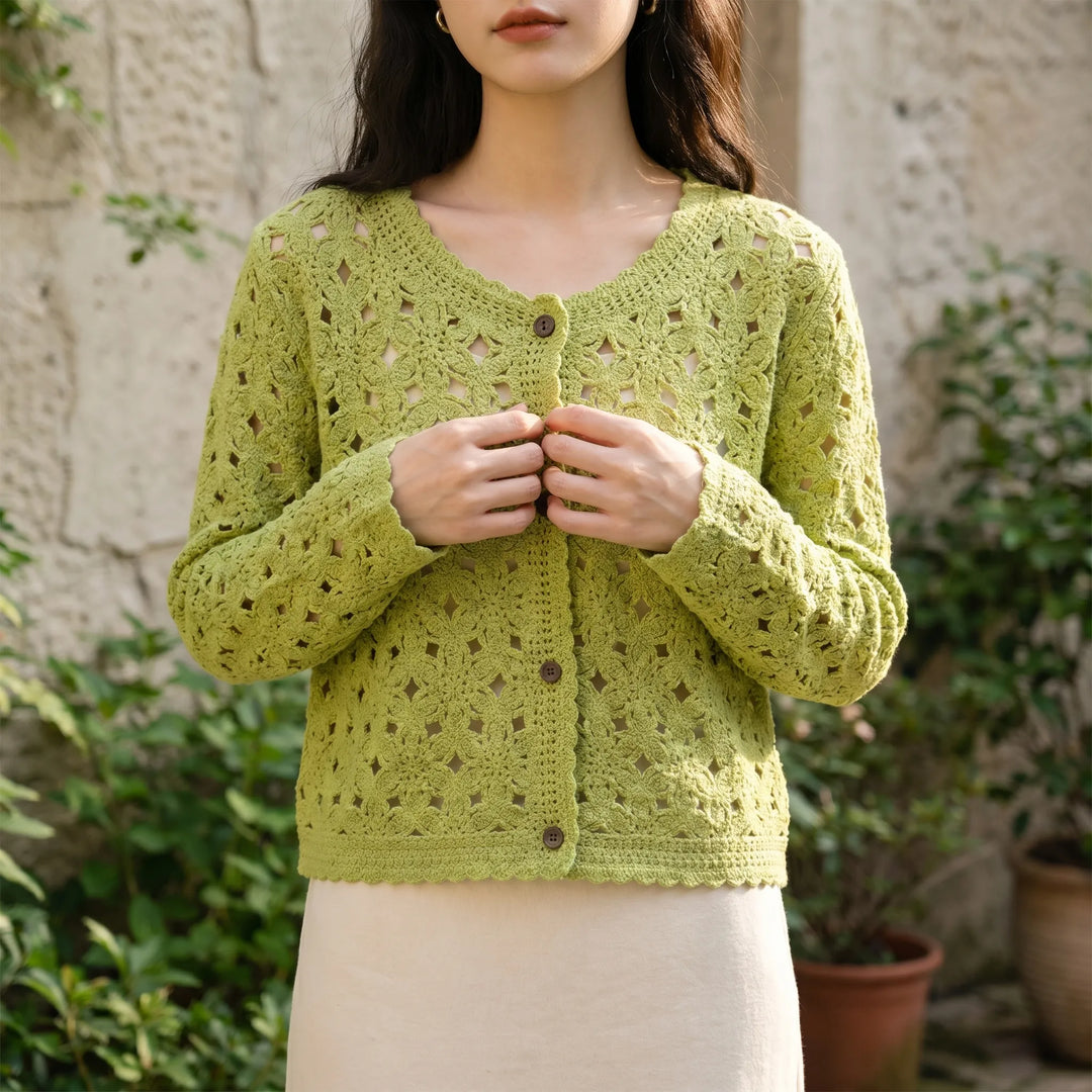 Women's openwork crochet cardigan, perfect lightweight summer layering for beach or casual wear.