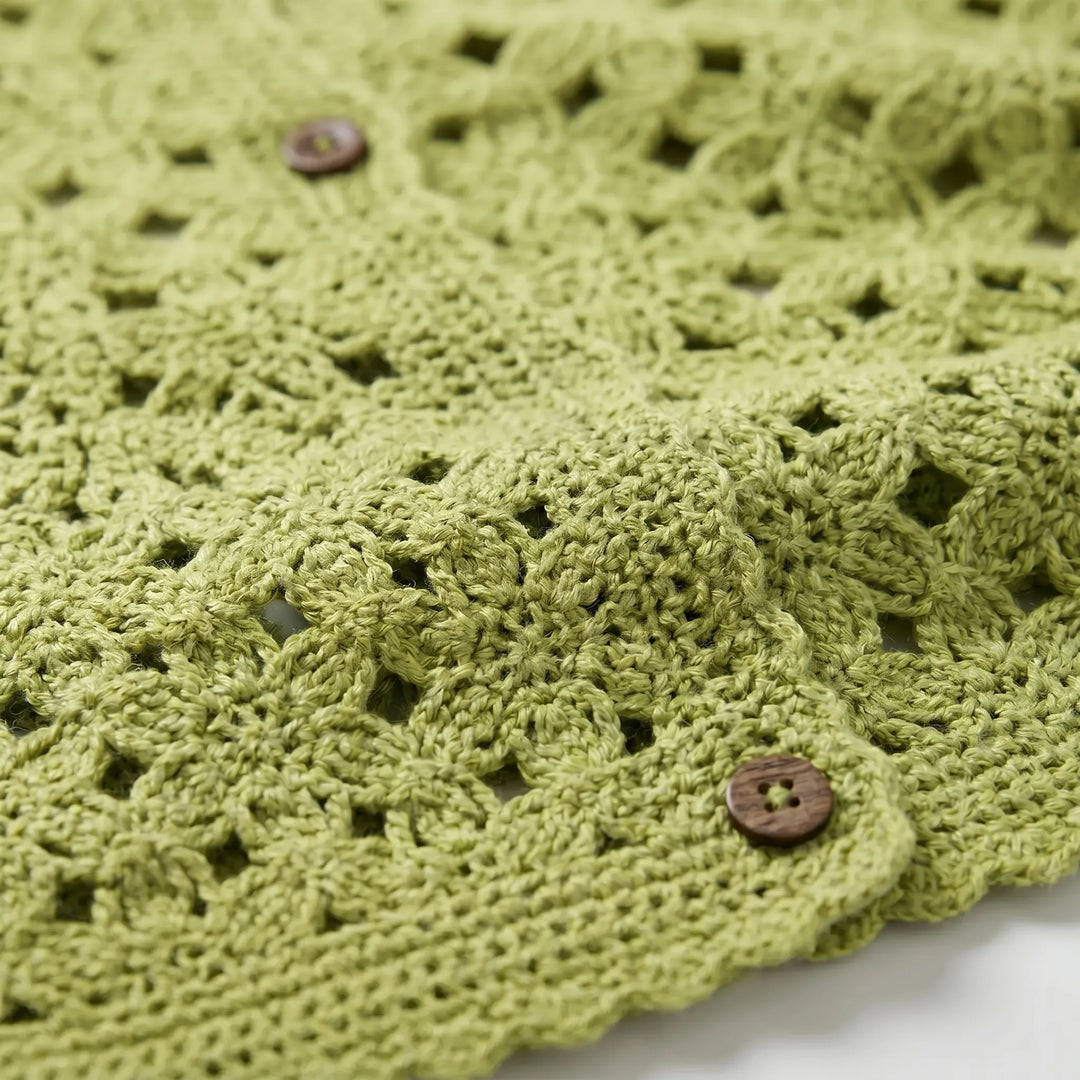 Lightweight women's crochet openwork cardigan, versatile for summer beachwear or casual spring outfits.