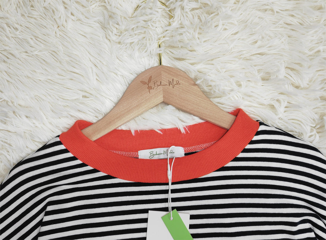 Comfortable women's striped cotton long sleeve top, perfect for versatile everyday casual wear.