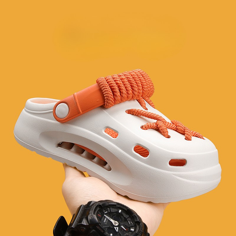 Side profile of Women's Orbit Laced Clogs, highlighting platform design & adjustable lacing.