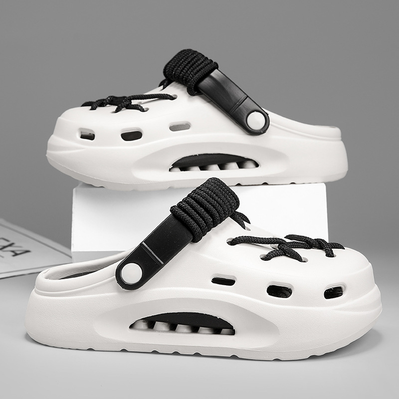 Woman walking comfortably in stylish Orbit Laced Clogs, versatile casual footwear.