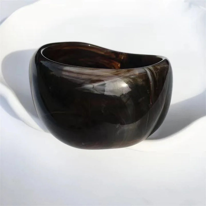 Unique women's irregular marble acrylic bracelet, a chic lightweight bangle jewelry piece with an organic feel.