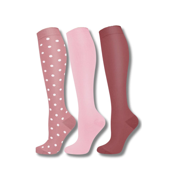 Women's travel compression socks, reducing leg swelling & enhancing comfort during long journeys.