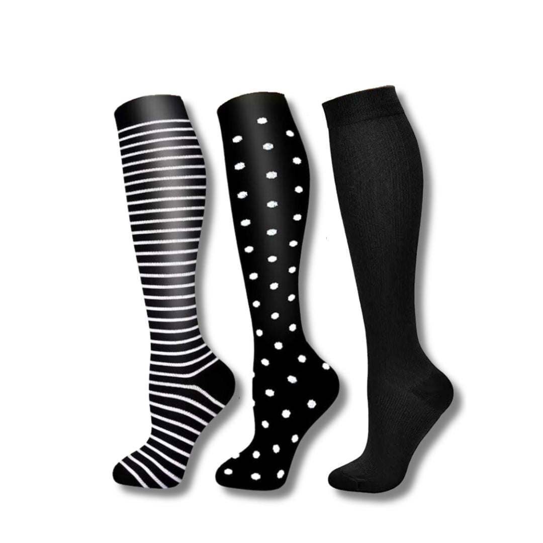 Athletic recovery compression socks for women, promoting faster muscle recovery & leg support.