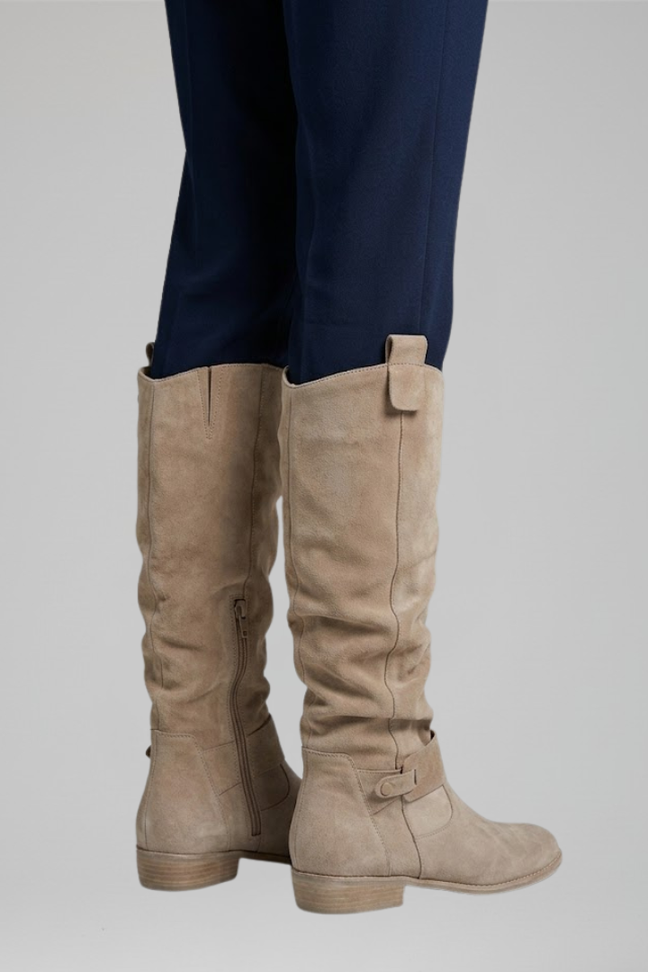 Orthopaedic knee-high boots for women with side zipper. Comfortable, supportive, and fashionable for fall/winter.