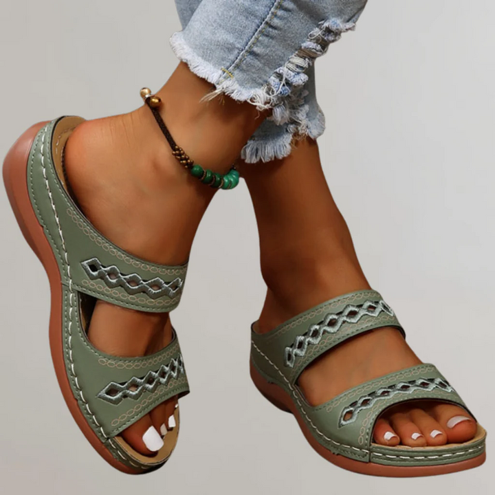 Fashionable women's orthopaedic sandals for summer. Comfortable walking shoes with arch support.