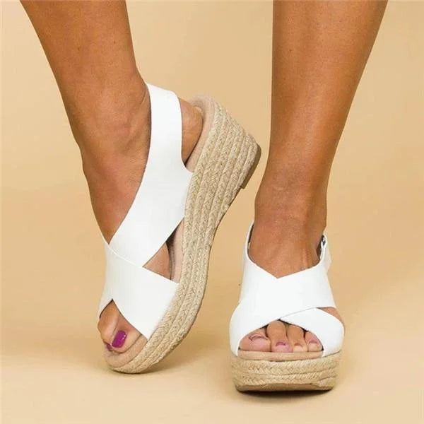 Fashionable women's espadrille wedge sandals with orthopaedic comfort for summer casual wear.