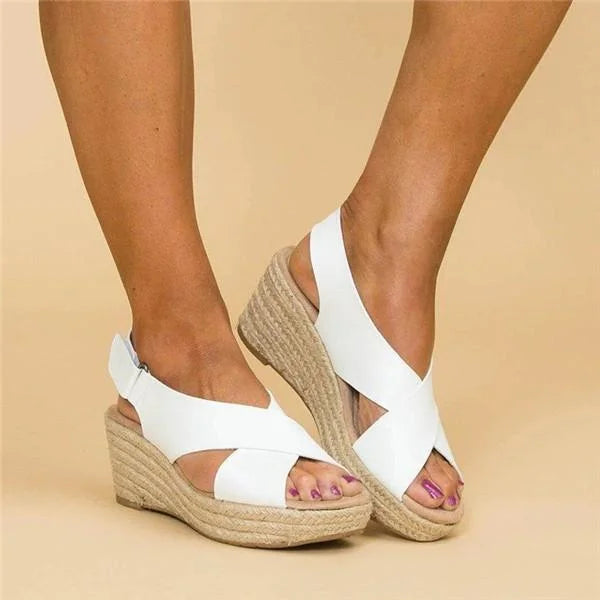 Stylish women's wedge espadrille shoes with orthopaedic foot support for comfortable walking.