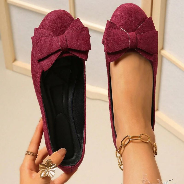 Versatile wide fit women's ballet flats with orthopaedic comfort and support.