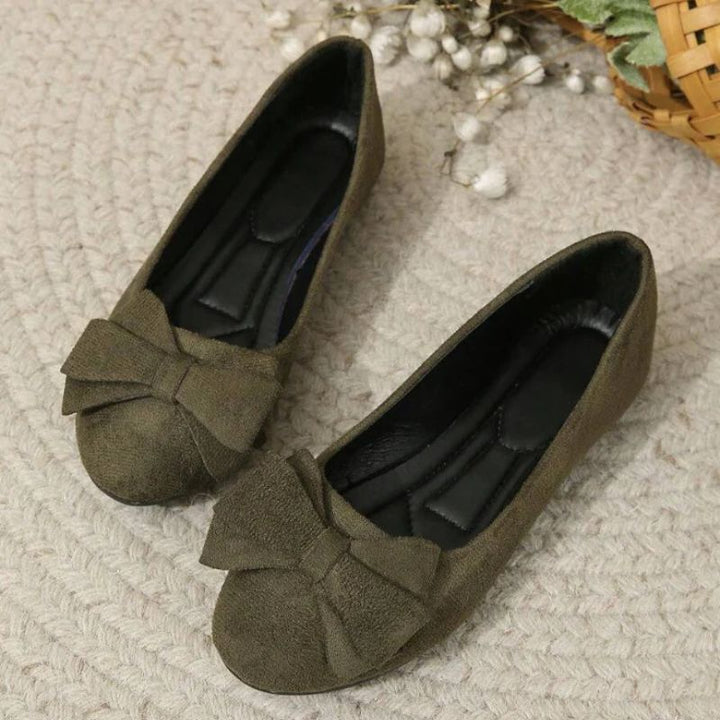 Women's comfortable wide fit flats, orthopaedic design for superior foot support.