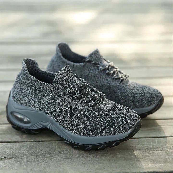 Women's orthopedic walking shoes providing foot pain relief with air cushion technology and stable sole.