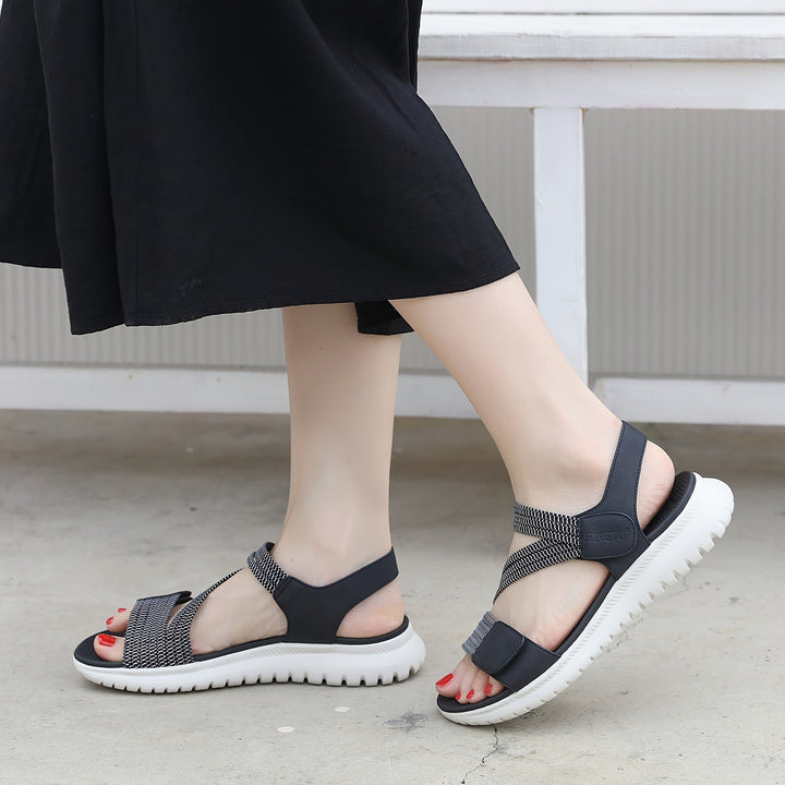 Side profile of women's supportive sandals, showing arch and heel cushioning for effective pain relief.