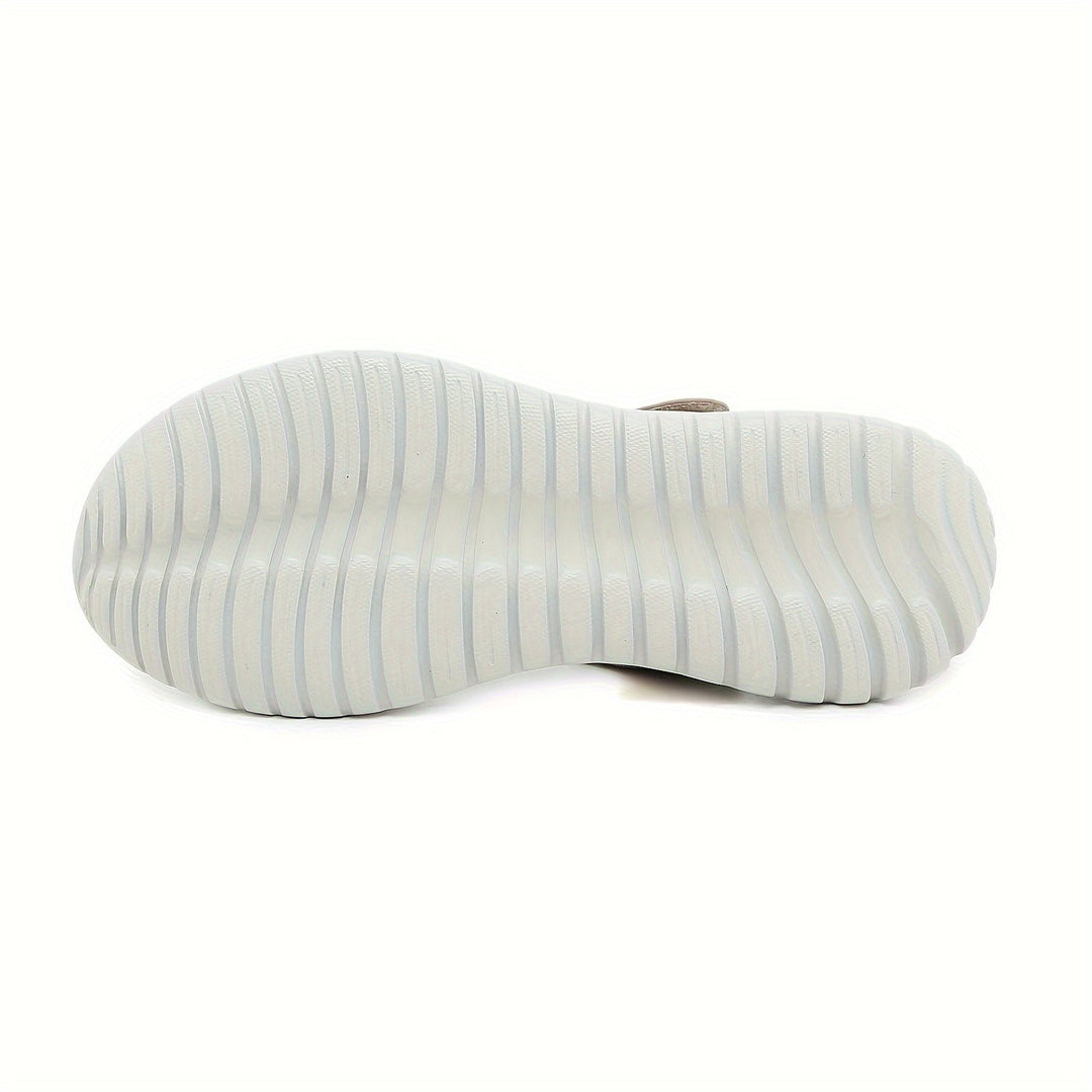 Women's therapeutic sandals providing superior arch support for heel and general foot pain relief.