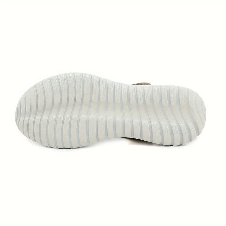 Women's therapeutic sandals providing superior arch support for heel and general foot pain relief.