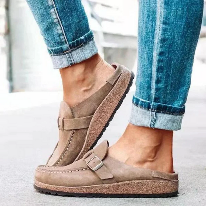 Women's orthopedic clogs with buckle strap. Versatile comfort shoes for summer, casual wear, and vacation.